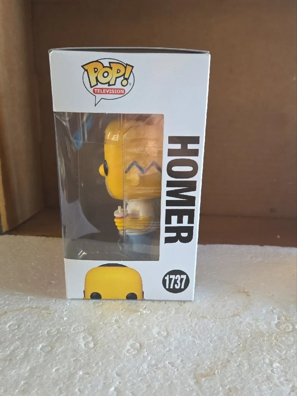Funko Pop! The Simpsons Homer Figure in Yellow, White & Blue